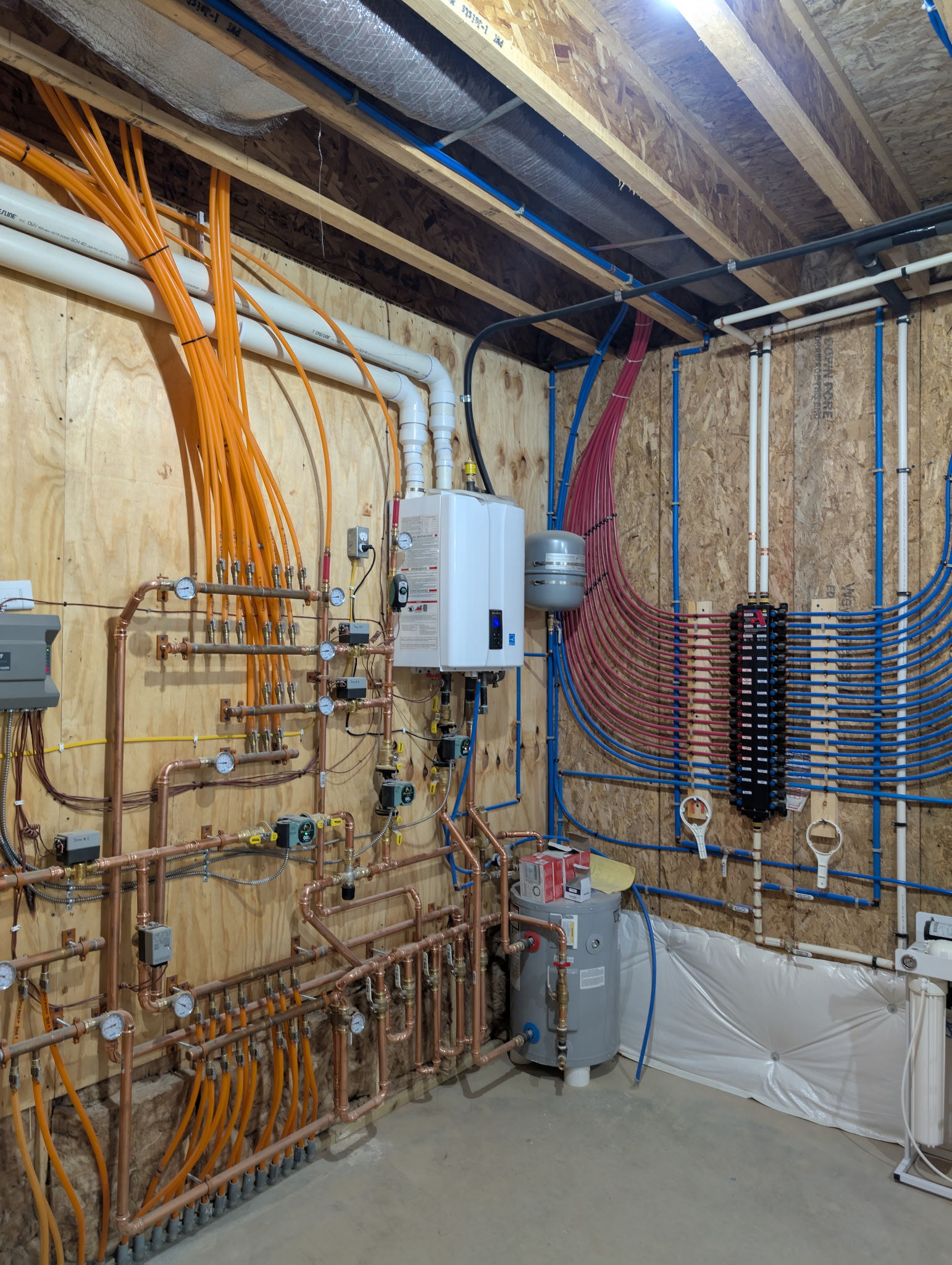 Z Tech Mechanical plumbing manifold, copper work, and water-heating installation